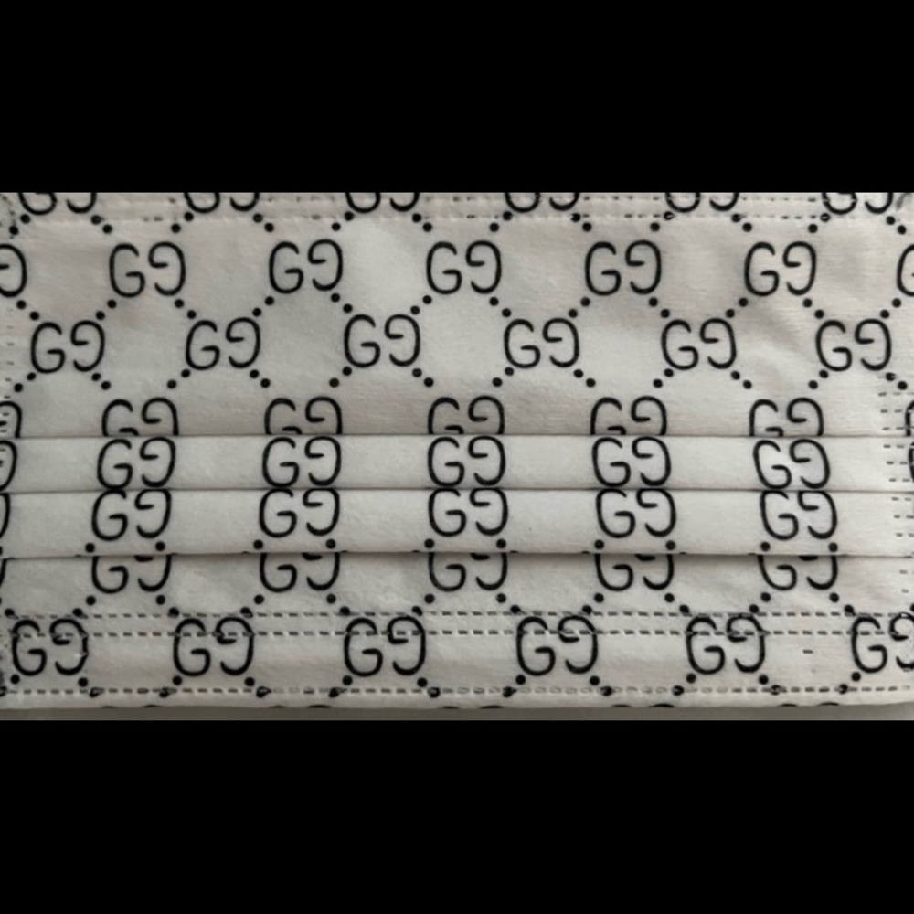 50 piece designer inspired face covering.